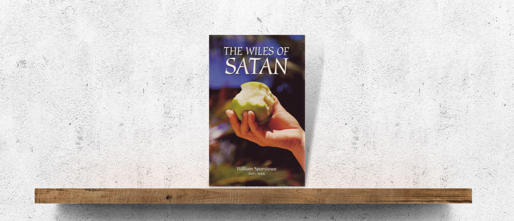 Image of the cover of the book 'The Wiles of Satan' on a bookshelf.